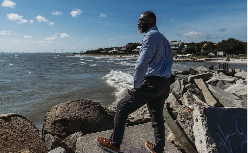Michael Allen is seen here looking out from the former quarantine site for enslaved Africans brought to Sullivan’s Island.