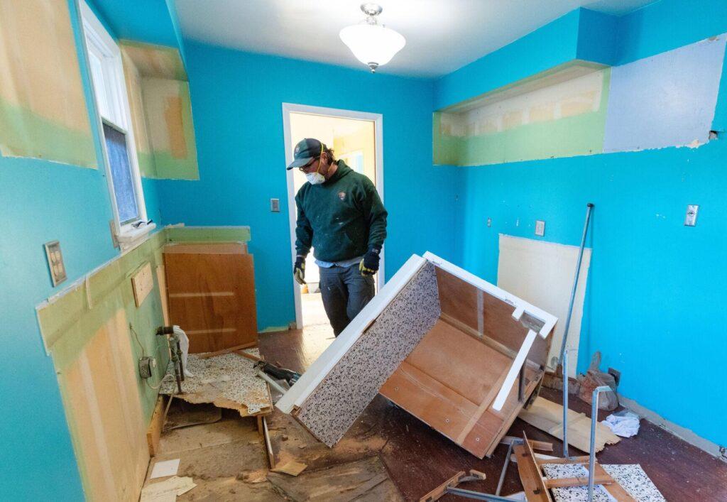 A kitchen is dismantled as part of a housing improvement project in Yellowstone in 2020.